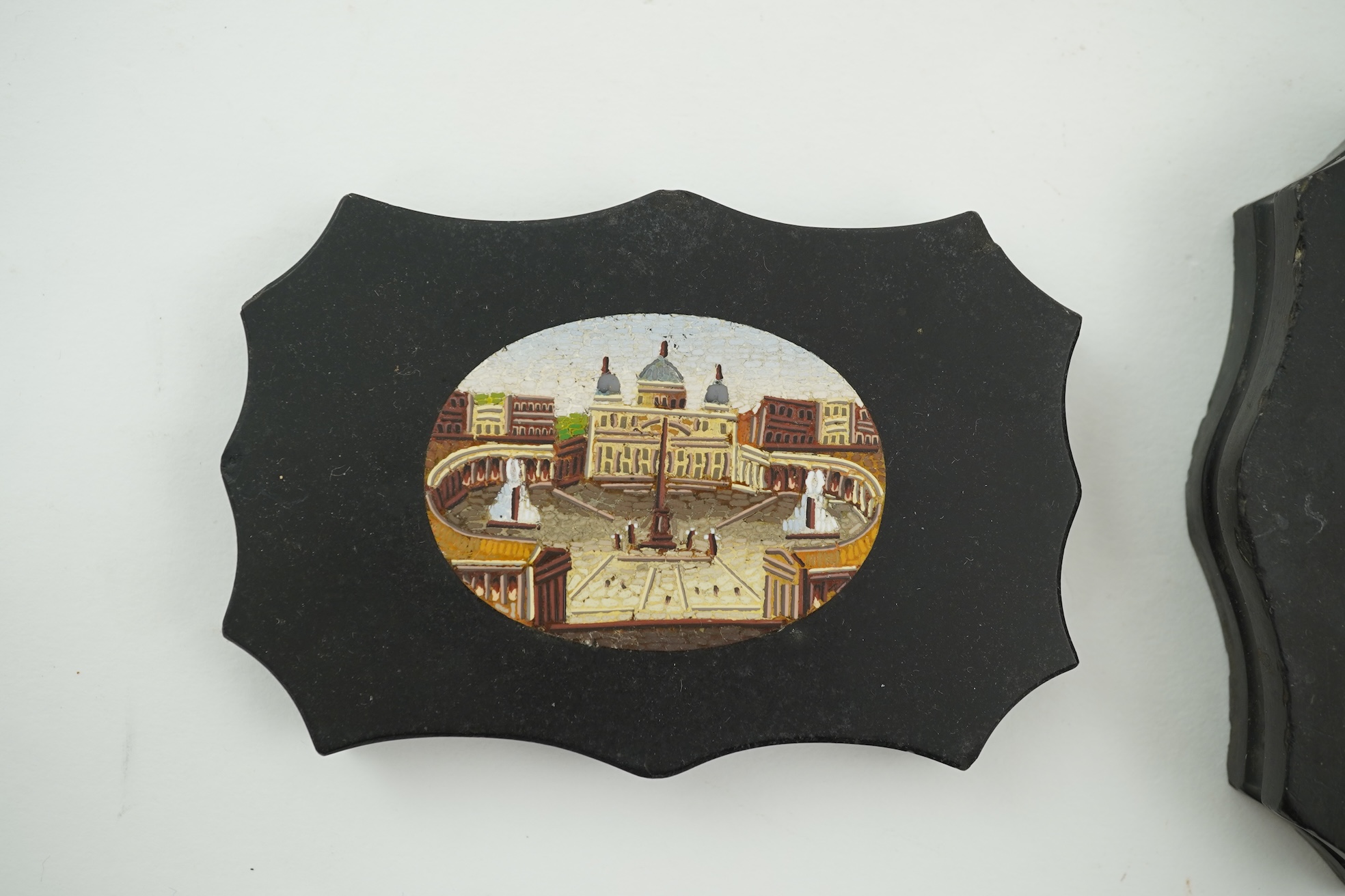 Two Italian micro-mosaic inlaid black slate paperweights, 19th century